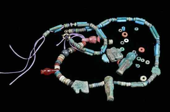 Appraisal: ANCIENT EGYPTIAN CERAMIC BEAD NECKLACE Turquoise glazed cylindrical beads with