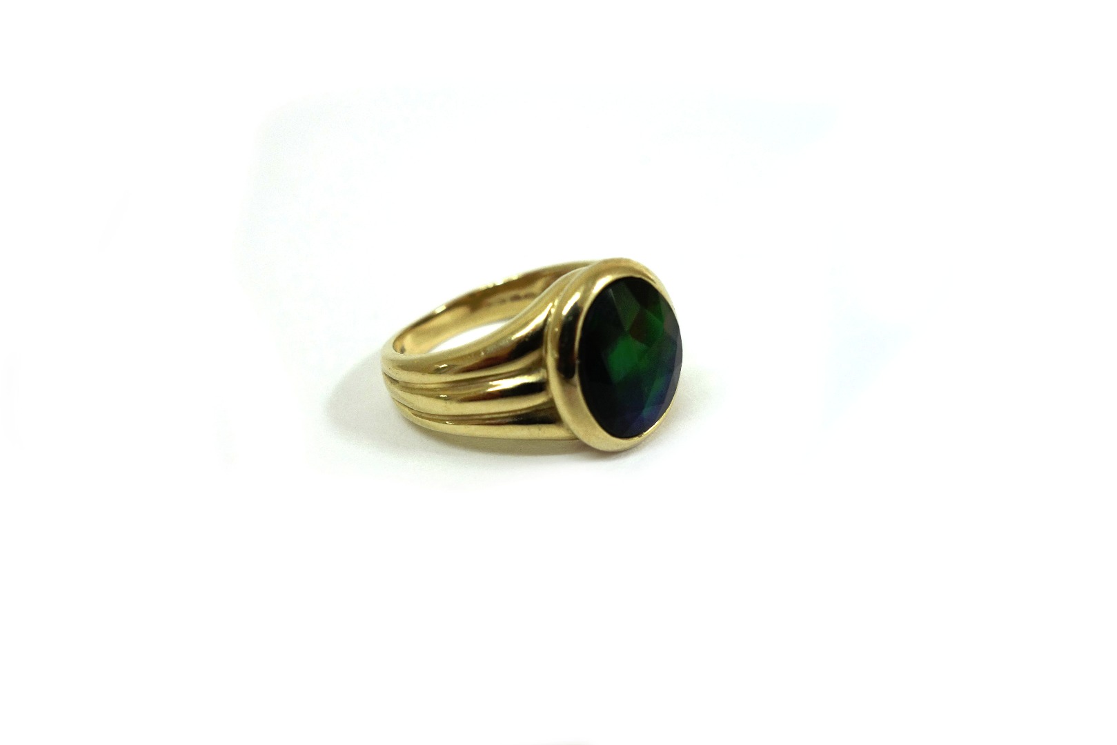 Appraisal: A ct yellow gold and faceted ammolite ring the rose-cut