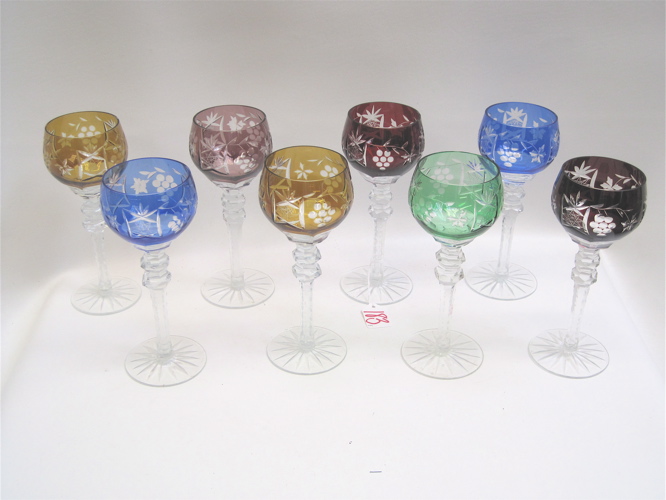 Appraisal: EIGHT HAND CUT CRYSTAL HARLEQUIN WINE GOBLETS long stems five