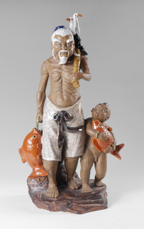 Appraisal: CHINESE POLYCHROME FIGURE OF ELDER FISHERMAN Ceramic figural grouping of