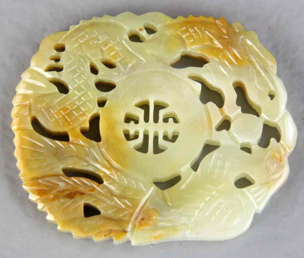 Appraisal: Chinese Qing Carved Yellow Jade PlacqueFinely carved to depict two