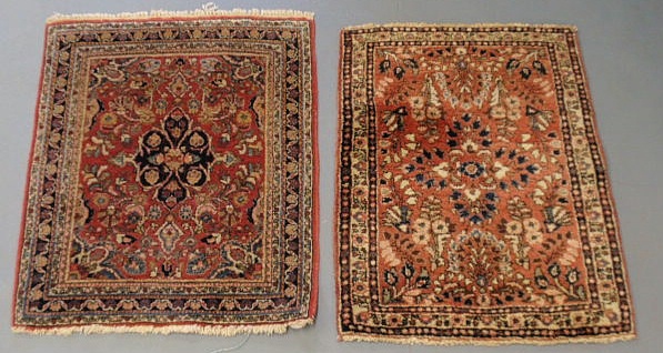 Appraisal: Two similar Sarouk oriental mats red fields and overall floral