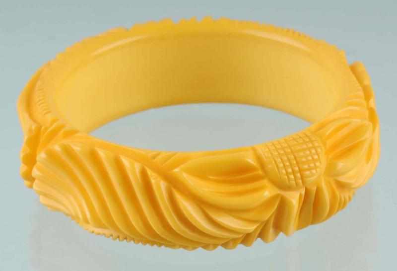 Appraisal: Bakelite Cream-Colored Carved Bracelet Condition Excellent Size - Dia