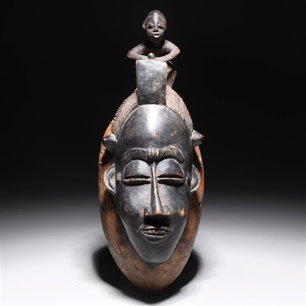 Appraisal: West African tribal Ligbi mask carved from a single piece