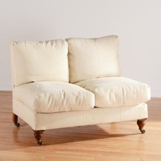 Appraisal: Howard Sons linen upholstered armless settee Howard Sons linen upholstered