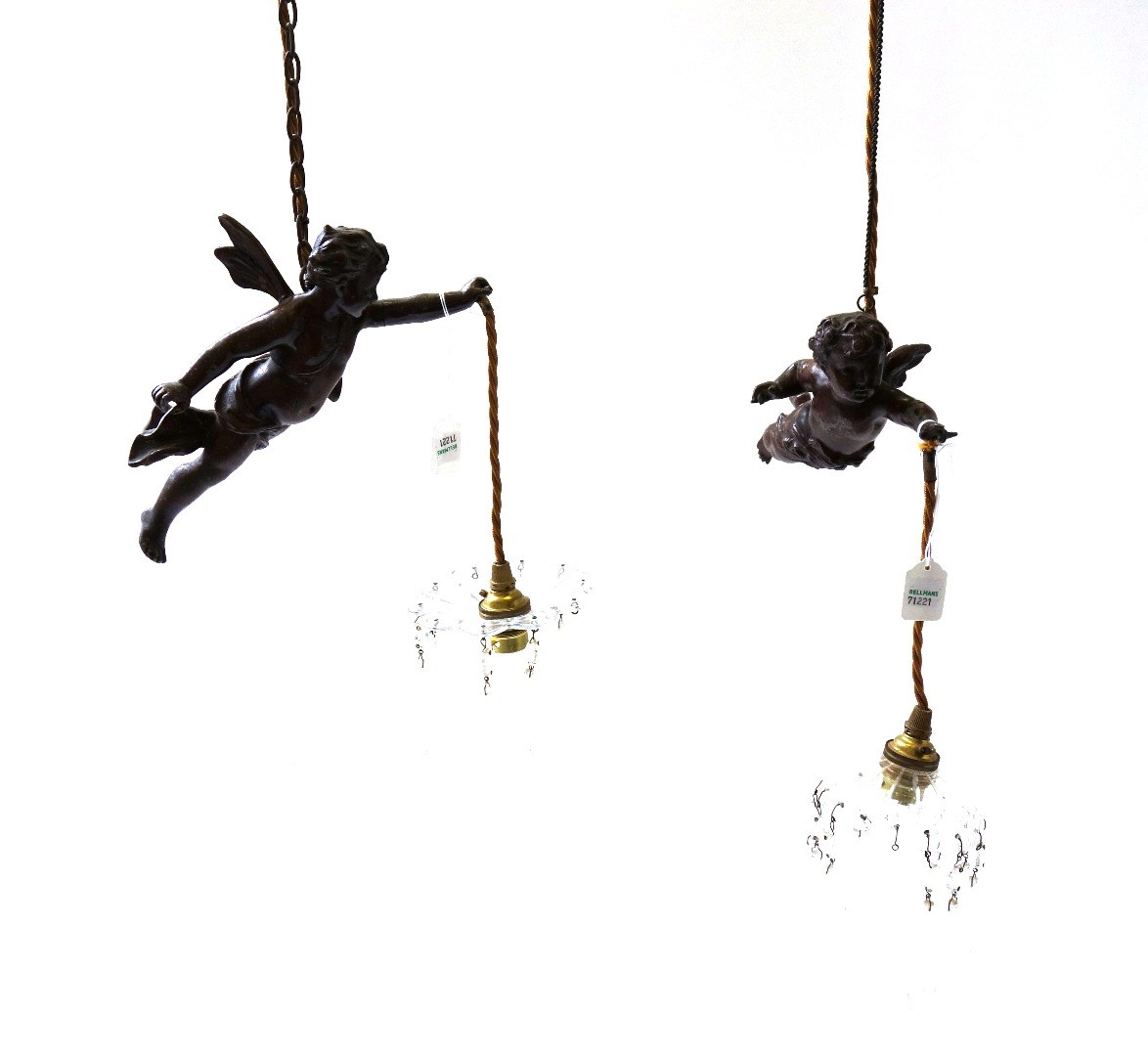 Appraisal: Three patinated spelter cherubic figural ceiling lights early th century