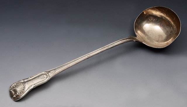 Appraisal: A WILLIAM IV SILVER KINGS PATTERN SOUP LADLE cm long