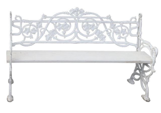 Appraisal: White painted cast iron garden bench th c cast iron