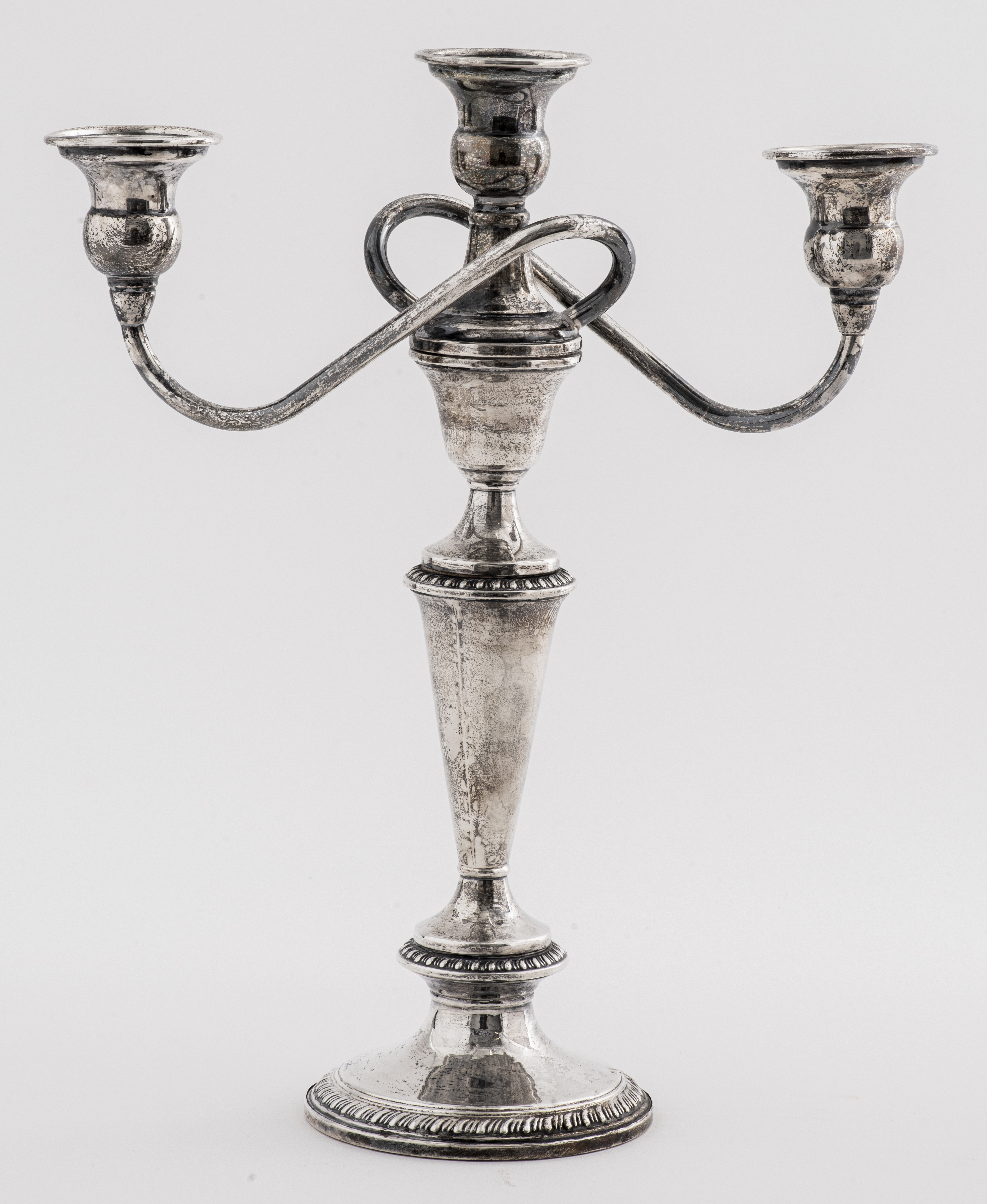 Appraisal: CROWN WEIGHTED STERLING CANDELABRA Crown weighted sterling silver candelabra marked