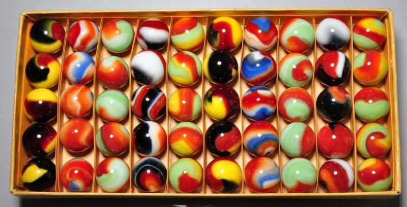 Appraisal: Akro Agate Red Box of Tri-Color Marbles Description Unmarked box