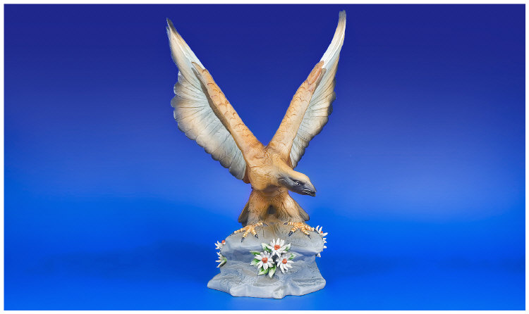 Appraisal: Capodimonte Figure Bird Of Prey Perched On A Rocky Base