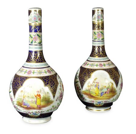 Appraisal: A pair of th century English porcelain bottle vases and