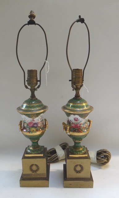 Appraisal: A pair of brass and porcelain mounted lamp bases th