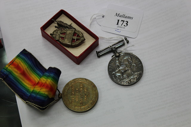 Appraisal: A WAR MEDAL together with a Great War medal both