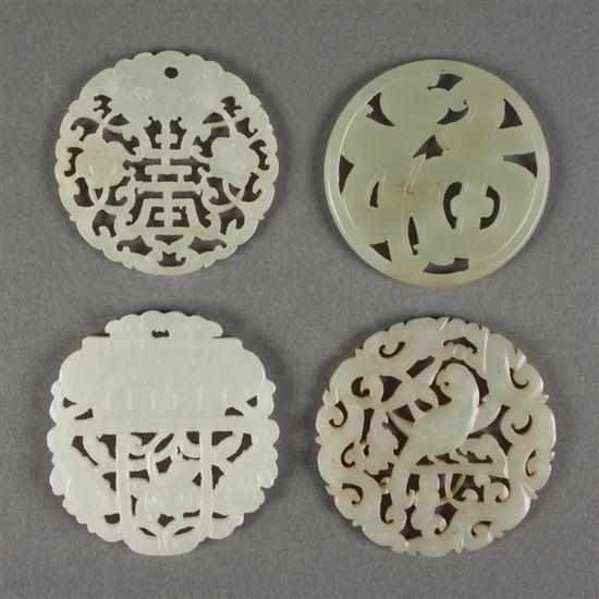 Appraisal: Four Chinese reticulated pale green jade ornaments th and th