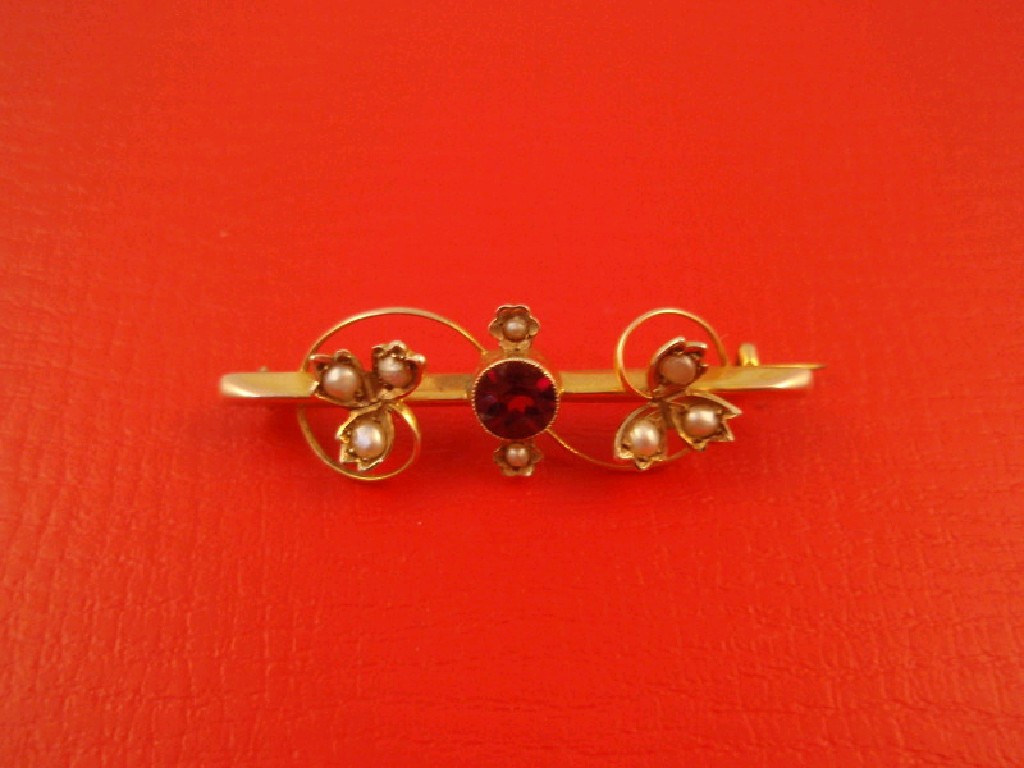 Appraisal: An Edwardian garnet and seed pearl set bar brooch ct