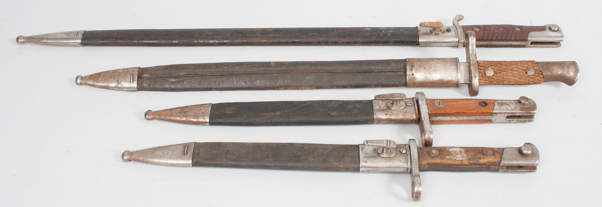 Appraisal: Four military bayonets with sheaths