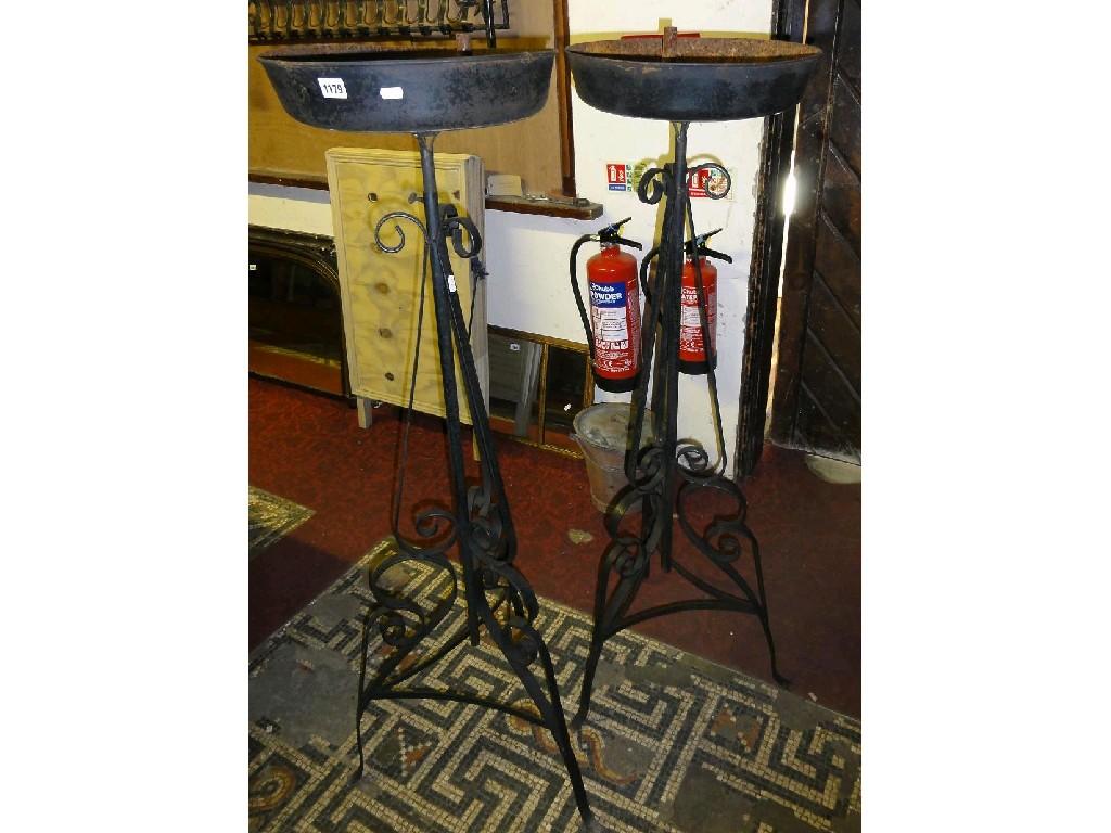 Appraisal: A pair of iron work floor standing telescopic conservatory stands