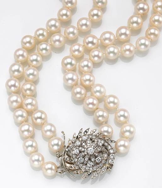 Appraisal: A cultured pearl diamond and eighteen karat white gold necklace