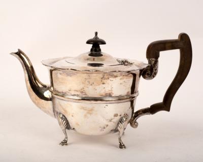 Appraisal: A silver teapot HW Sheffield circa approximately gm