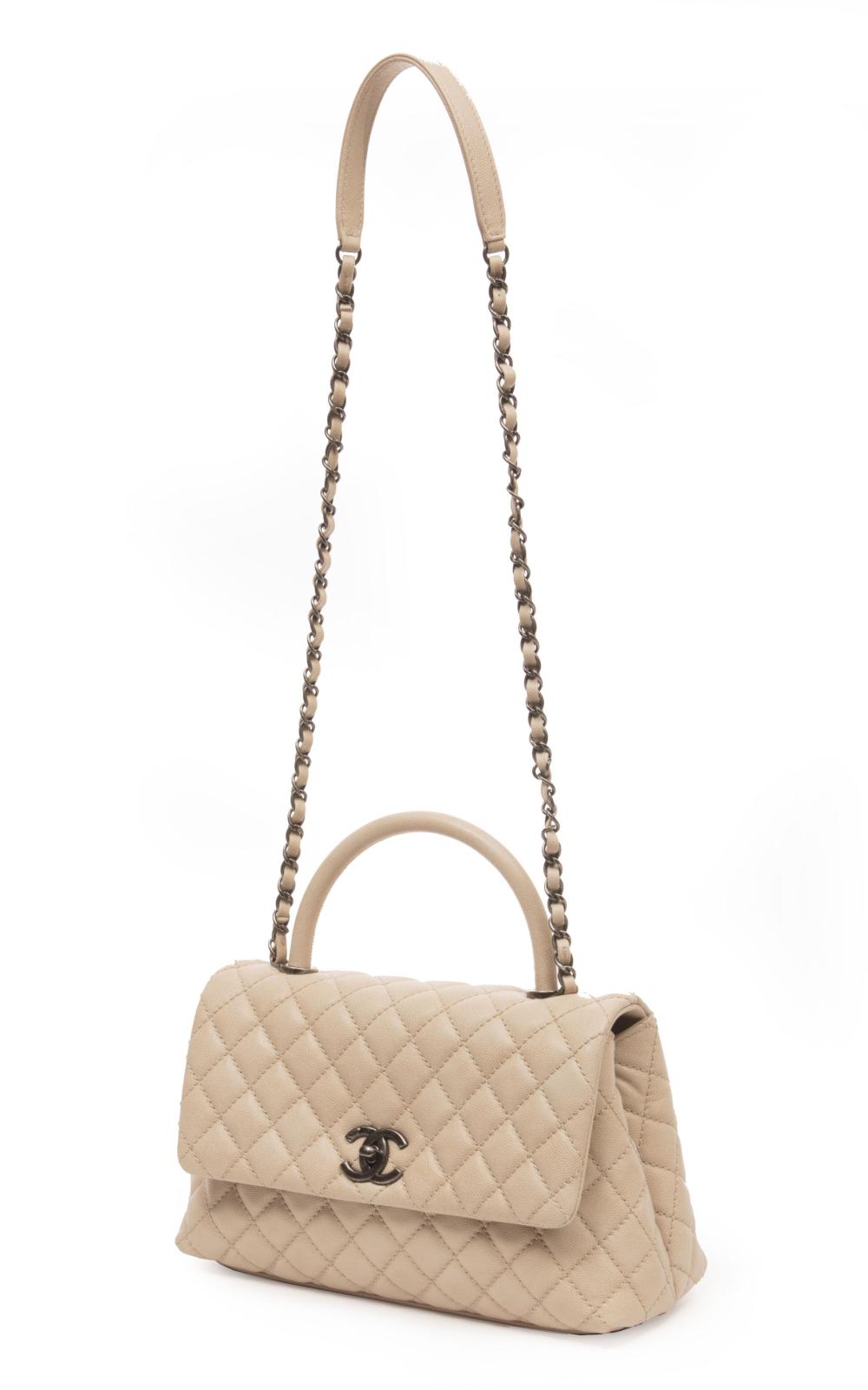 Appraisal: Chanel Caviar Leather Coco Handle Flap Handbag quilted beige leather