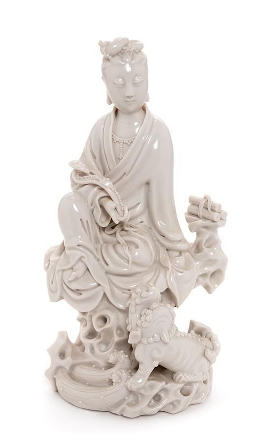 Appraisal: A Blanc-de-Chine Porcelain Figure of Guanyin Height inches A Blanc-de-Chine