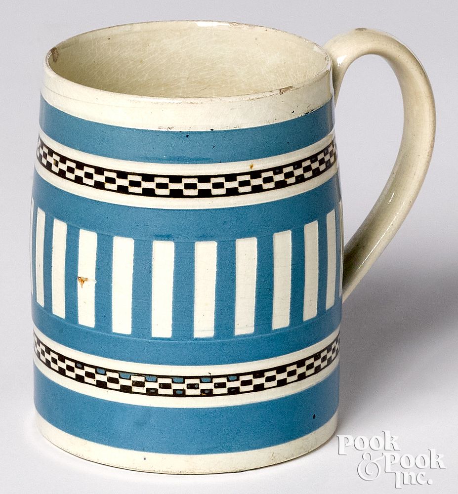 Appraisal: Mocha mug Mocha mug with blue and white engine turned