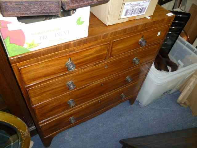 Appraisal: A GEORGIAN MAHOGANY CHEST of two short and three long