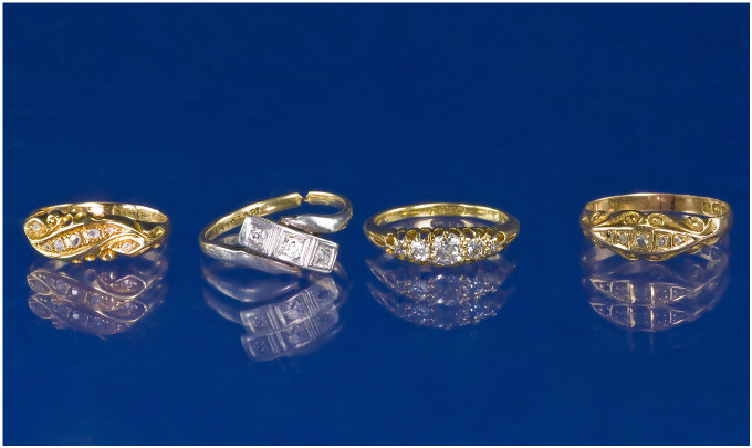 Appraisal: Collection Of Four ct Gold Rings Comprising An Edwardian Stone