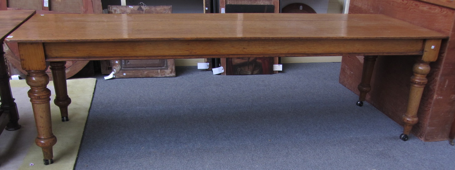 Appraisal: A th century oak rectangular dining table on turned supports