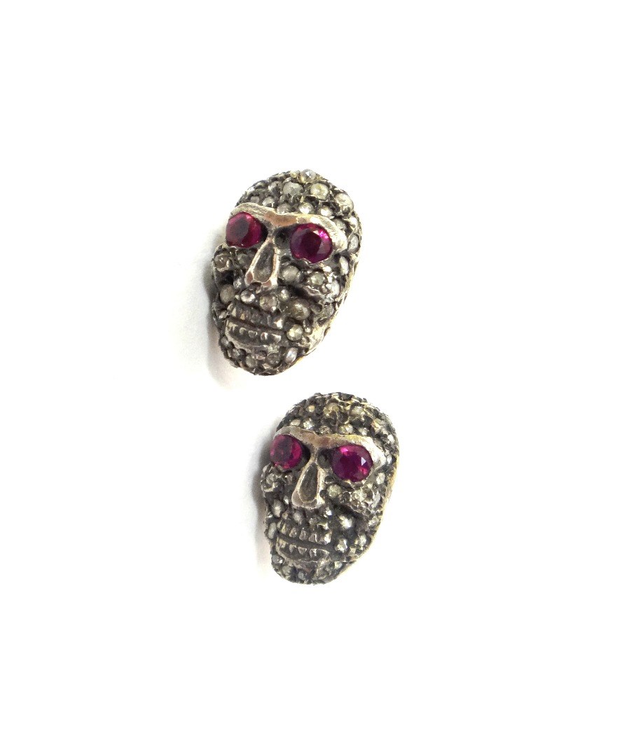 Appraisal: A pair of rose diamond and treated ruby set earstuds