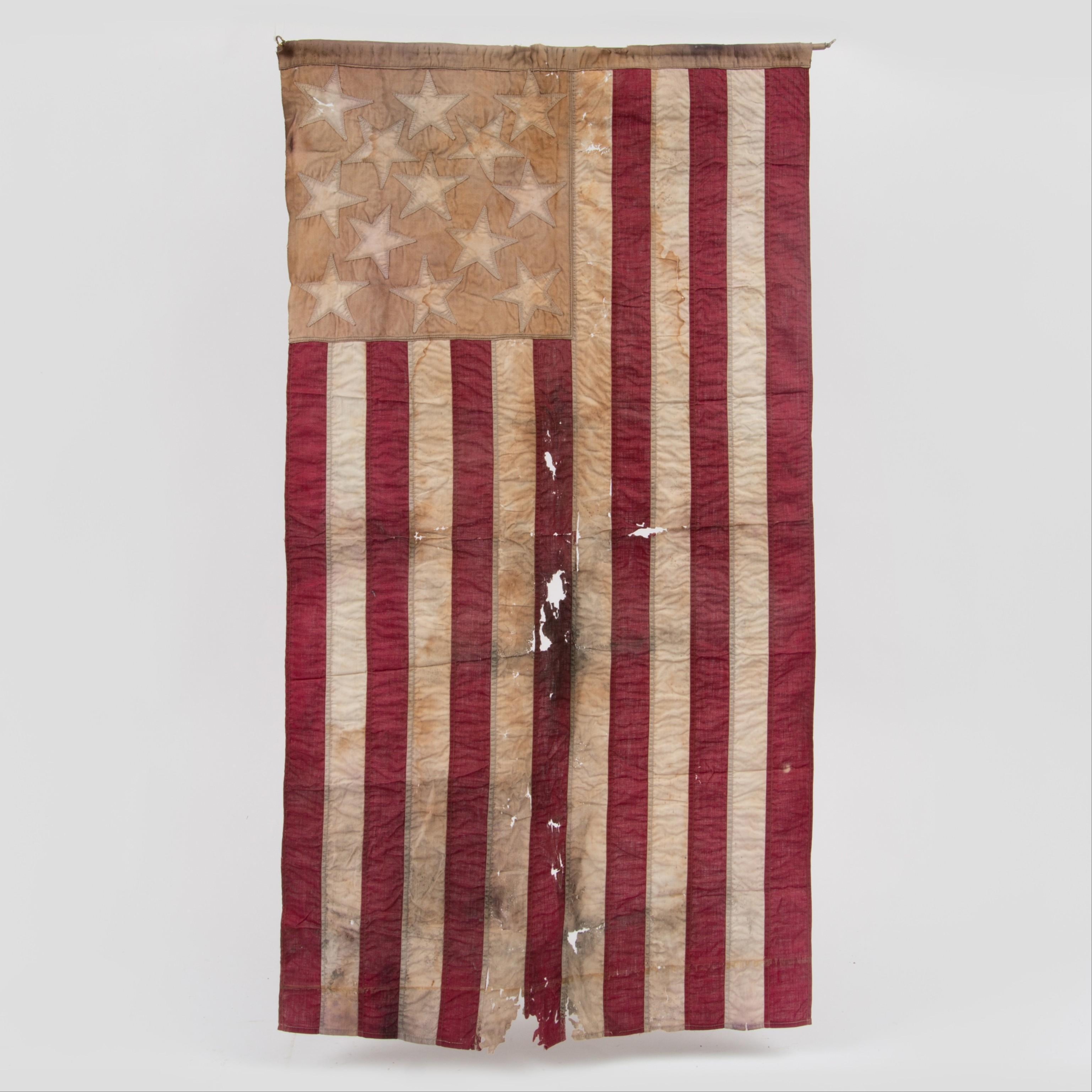 Appraisal: TH C THIRTEEN STAR US FLAG A hand-sewn star pattern