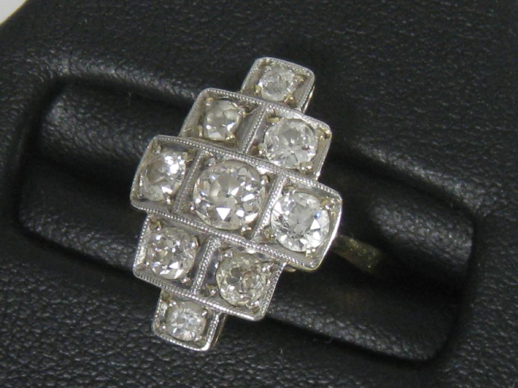 Appraisal: An Art Deco Diamond Cocktail Ring the stepped lozenge shaped