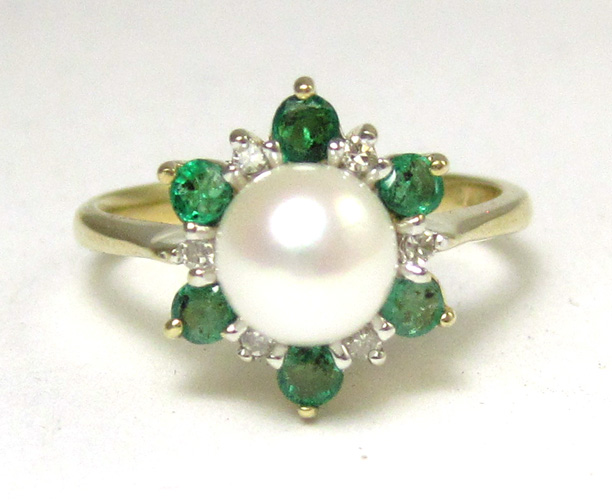 Appraisal: EMERALD PEARL AND DIAMOND RING k yellow gold centering a