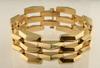 Appraisal: BRACELET - Retro K gold link bracelet composed of faceted