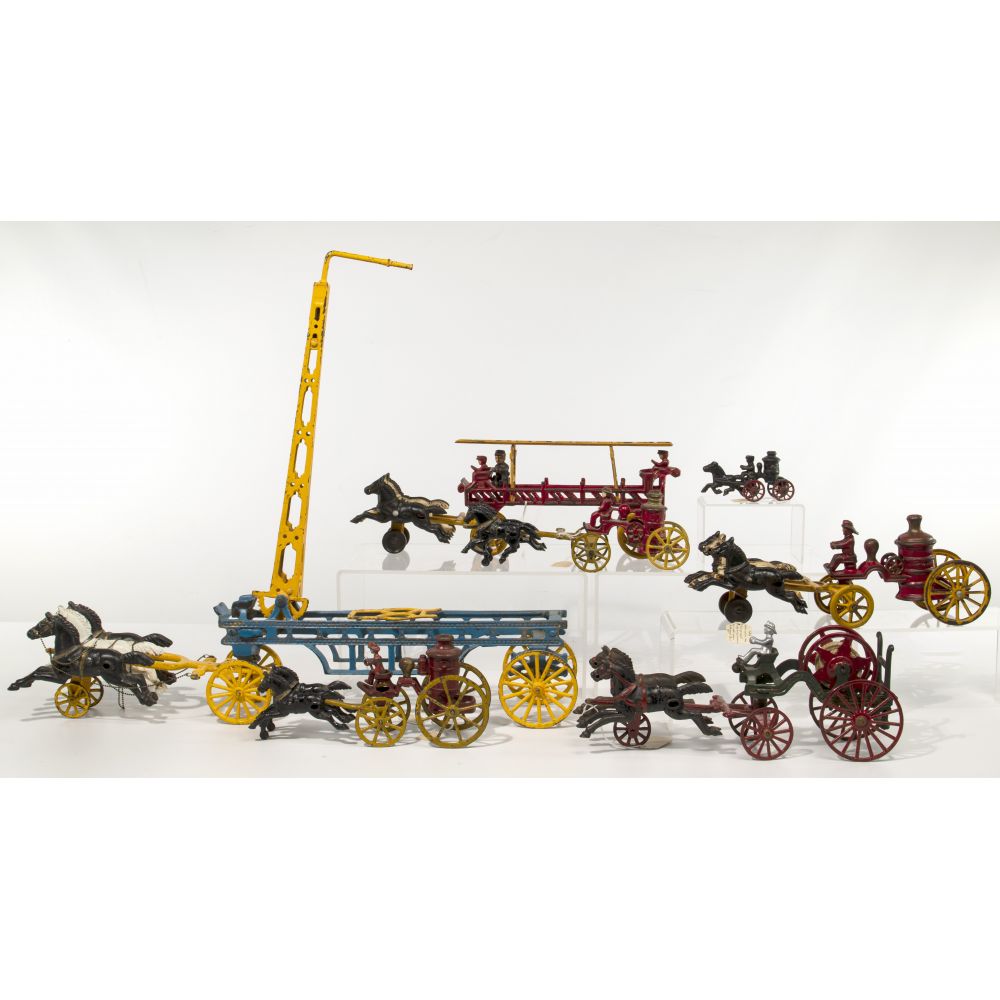 Appraisal: CAST IRON HORSE CARRIAGE FIRE TRUCK ASSORTMENT items most connectable