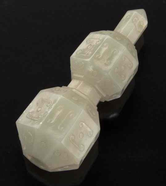 Appraisal: Chinese Qing carved jade pagoda shaped finial depicting scrolling clouds