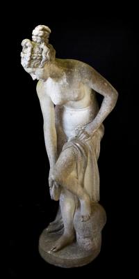 Appraisal: A reconstituted stone figure of a female bather cm high