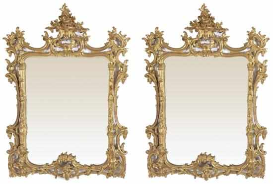 Appraisal: A PAIR OF CHIPPENDALE STYLE GILT WOOD WALL MIRRORS Each