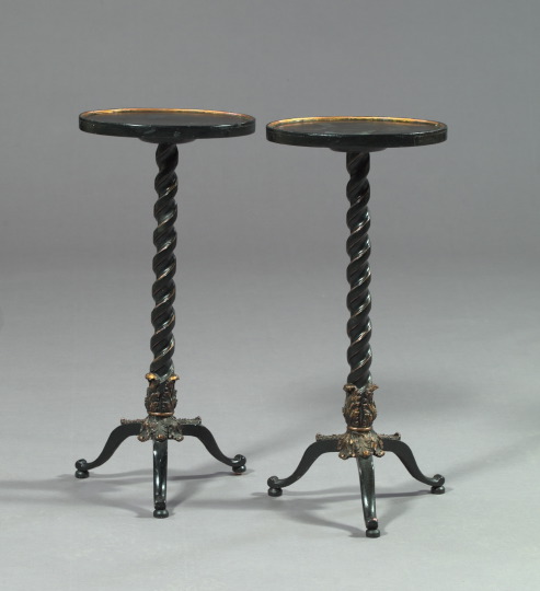 Appraisal: Pair of Continental Ebonized and Parcel-Gilt Plant Stands the ribbon-twist