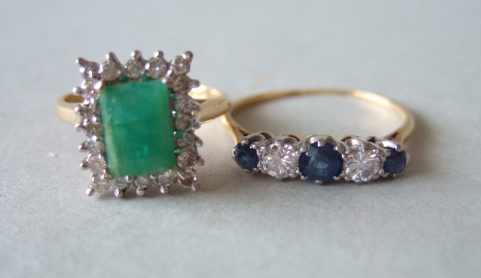 Appraisal: An ct gold emerald and diamond set rectangular cluster ring