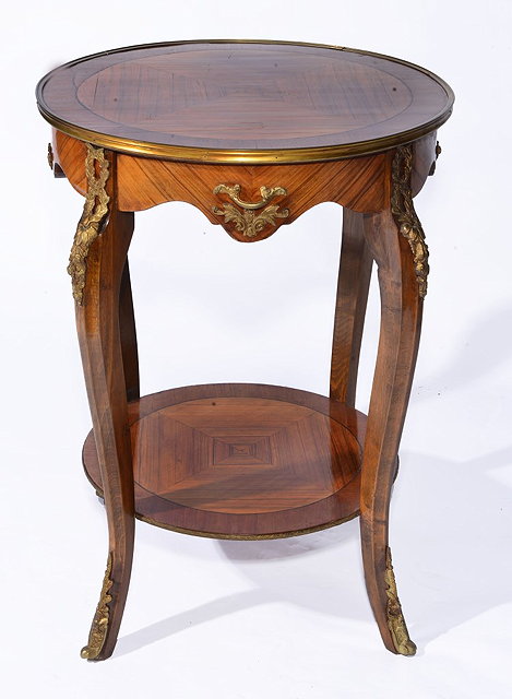 Appraisal: A FRENCH KINGWOOD AND GILT METAL TWO TIER OCCASIONAL TABLE