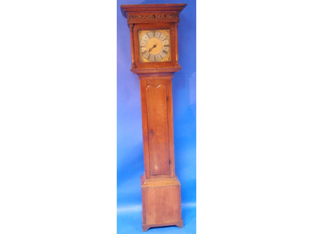 Appraisal: An thC oak long cased clock with blind fret frieze