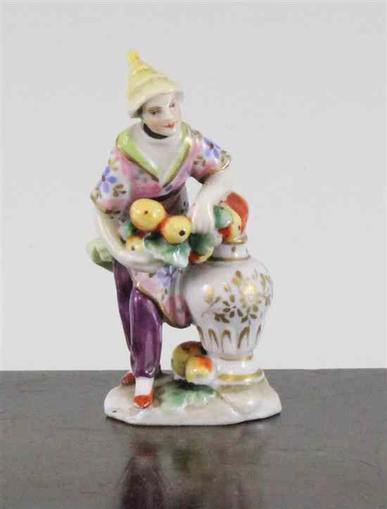 Appraisal: A French porcelain figural scent bottle late th century modelled