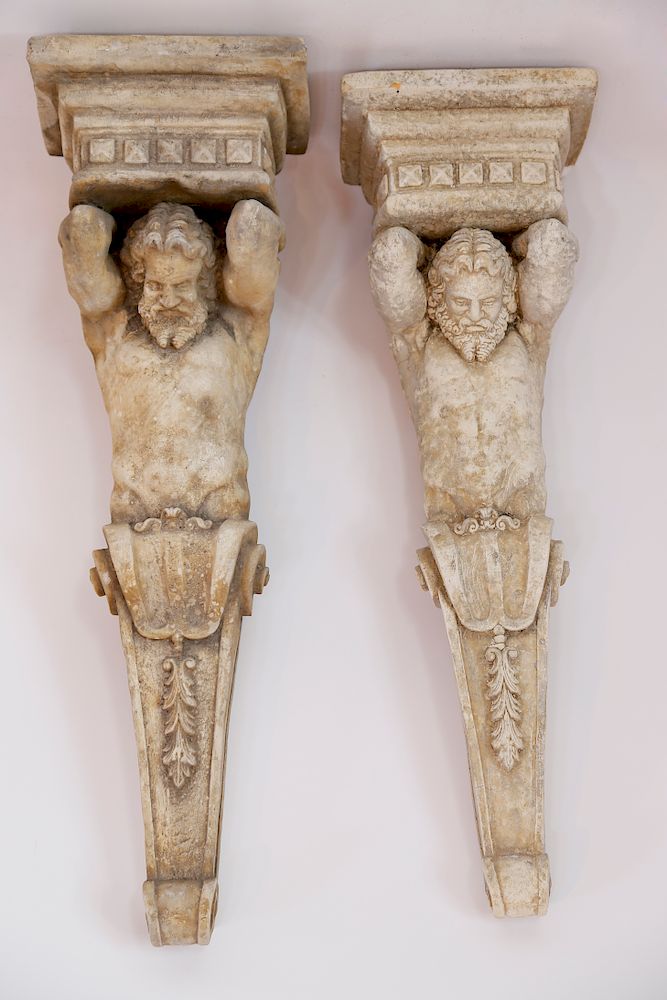 Appraisal: Pair of Romanesque Poured Cement Brackets of a Herculean Figure