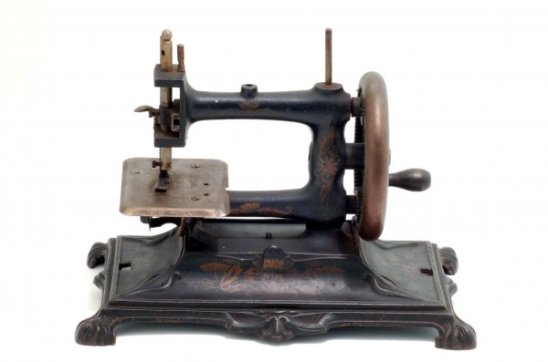 Appraisal: A Model No toy sewing machine by F W Muller