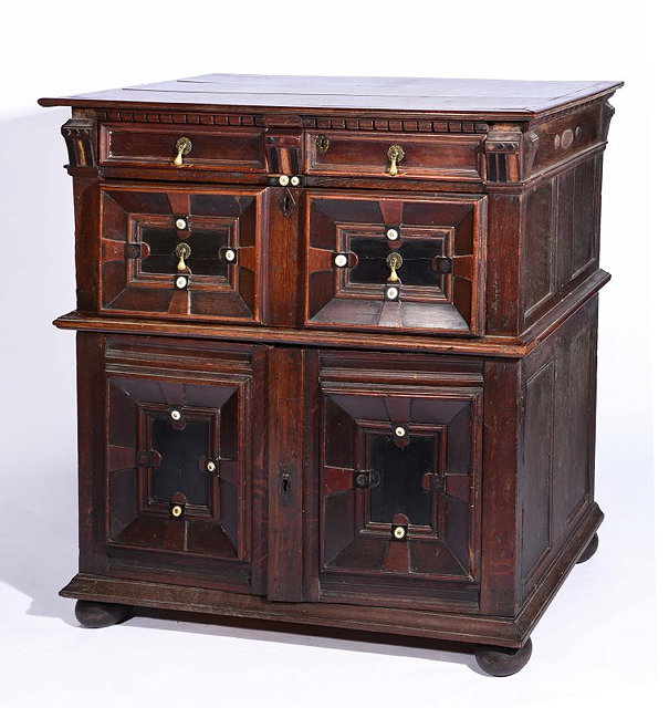 Appraisal: A TH CENTURY AND LATER OAK MOULDED FRONT CHEST inlaid