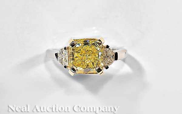 Appraisal: A Platinum and kt Gold Fancy Light Greenish Yellow Diamond