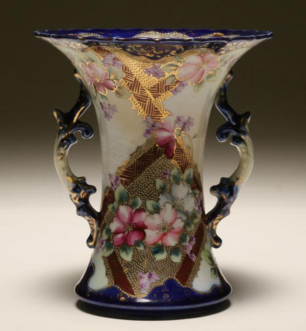 Appraisal: English hand painted floral porcelain vase with raised gilt and