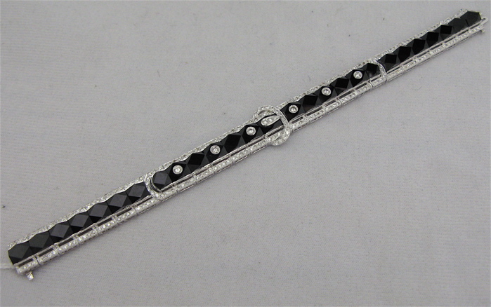 Appraisal: BLACK ONYX DIAMOND AND EIGHTEEN KARAT WHITE GOLD BRACELET -